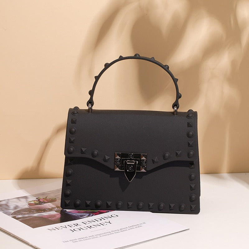 Bolso de PVC impermeable para mujer con cadena y tachuelas, estilo punk