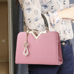 Bolso de mano y bandolera para mujer con bordado y asa superior