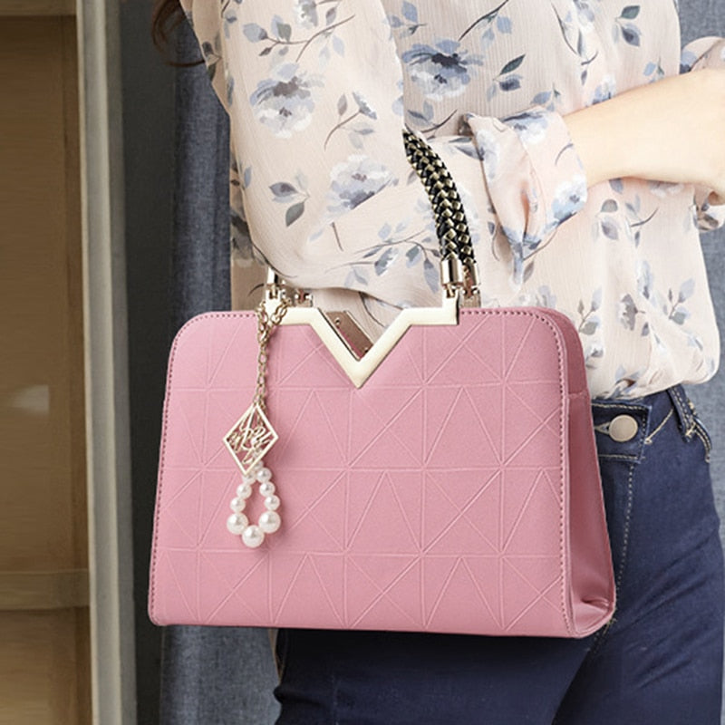 Bolso de mano y bandolera para mujer con bordado y asa superior