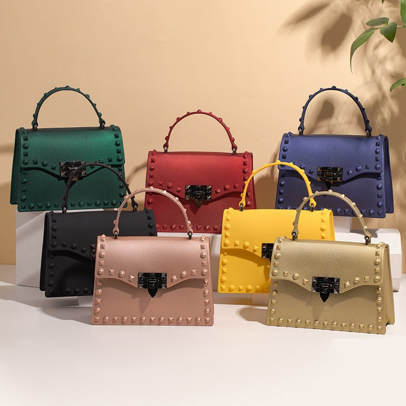 Bolso de PVC impermeable para mujer con cadena y tachuelas, estilo punk