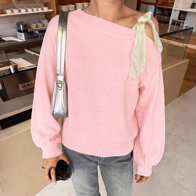 Shoulder tied bow long sleeved women's sweater