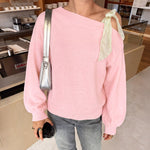 Shoulder tied bow long sleeved women's sweater