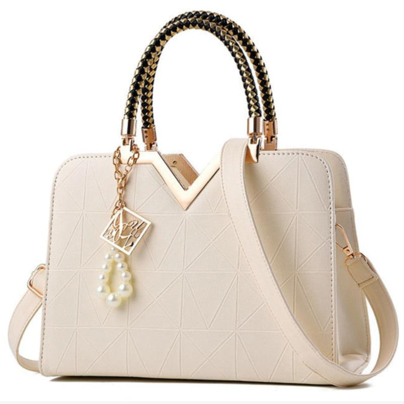 Bolso de mano y bandolera para mujer con bordado y asa superior