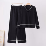 Conjunto de dos piezas con jersey holgado y pantalón.⠋  Conjunto