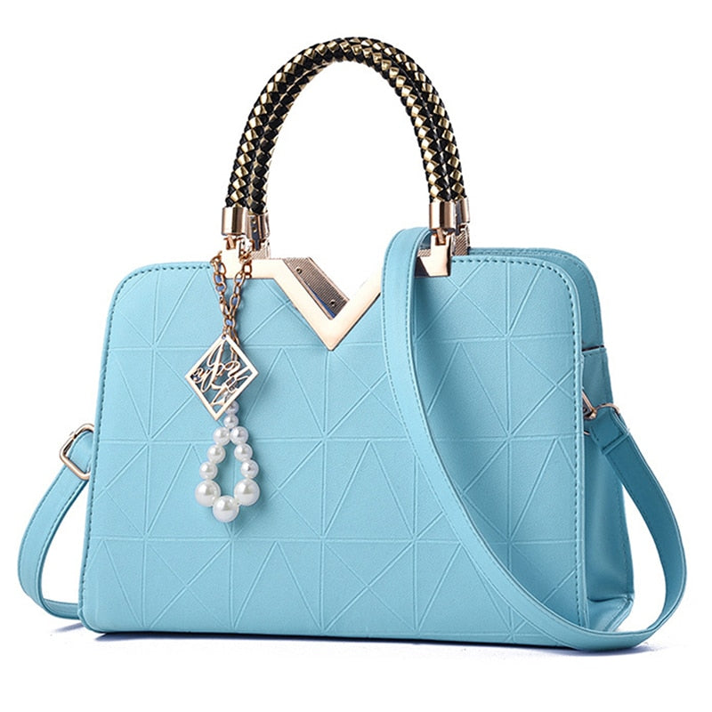 Bolso de mano y bandolera para mujer con bordado y asa superior