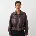 Pocket hem drawstring waist cinching leather jacket for women