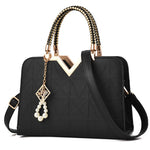 Bolso de mano y bandolera para mujer con bordado y asa superior
