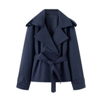 Double breasted jacket with waistband and suit collar