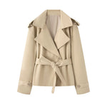 Double breasted jacket with waistband and suit collar