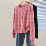 Striped cardigan with heart-shaped button sweater