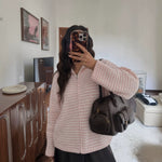Contrasting striped sweater