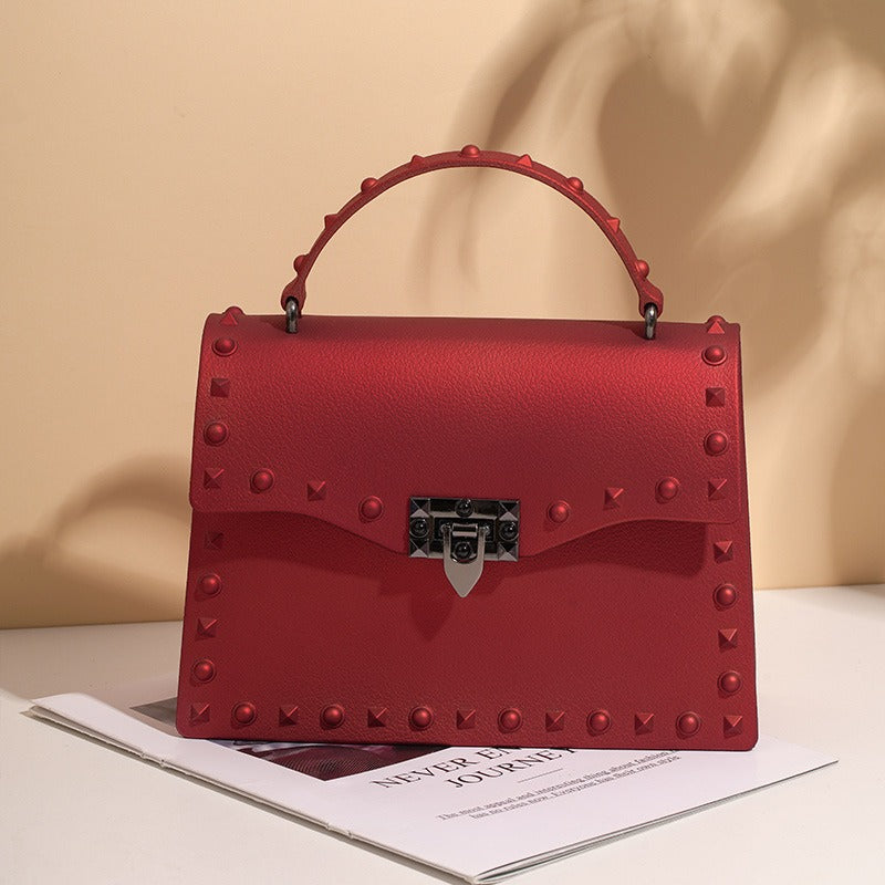 Bolso de PVC impermeable para mujer con cadena y tachuelas, estilo punk