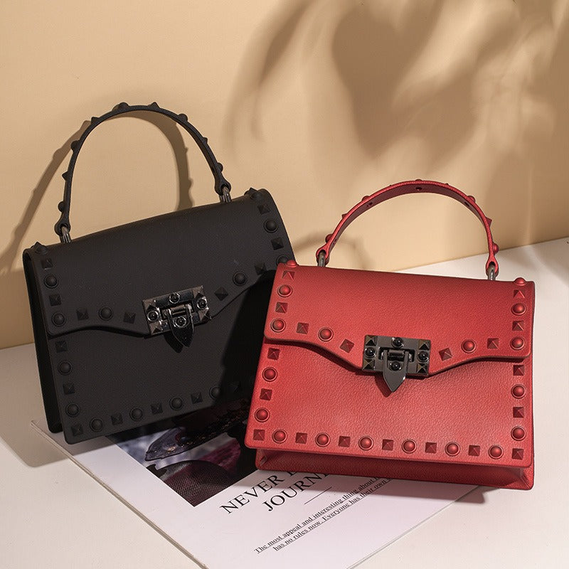 Bolso de PVC impermeable para mujer con cadena y tachuelas, estilo punk