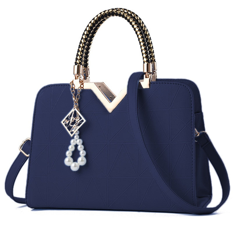 Bolso de mano y bandolera para mujer con bordado y asa superior