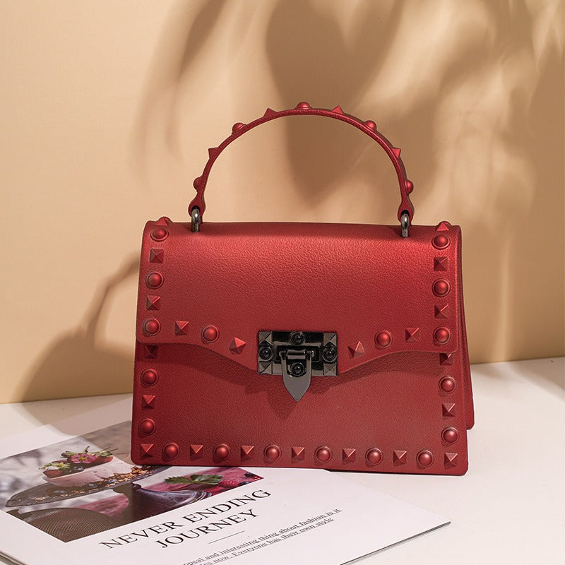 Bolso de PVC impermeable para mujer con cadena y tachuelas, estilo punk