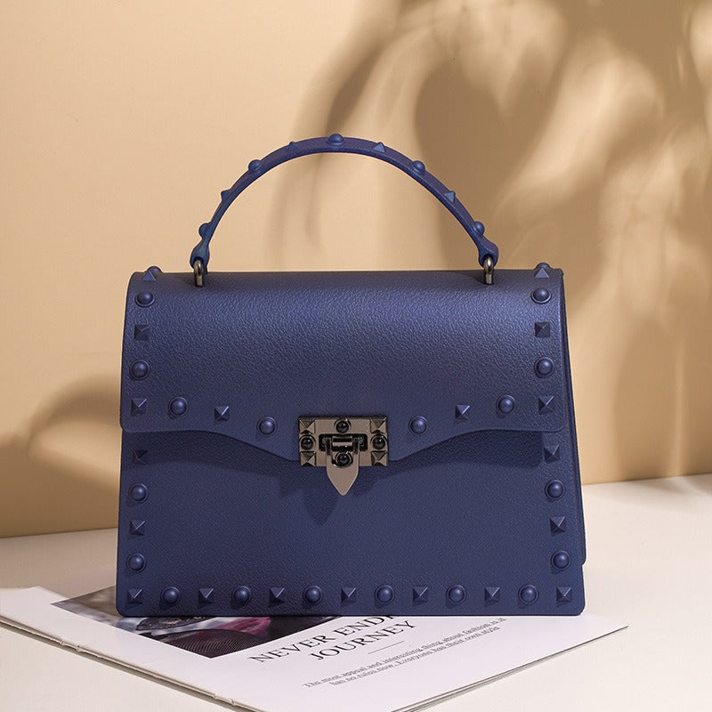 Bolso de PVC impermeable para mujer con cadena y tachuelas, estilo punk