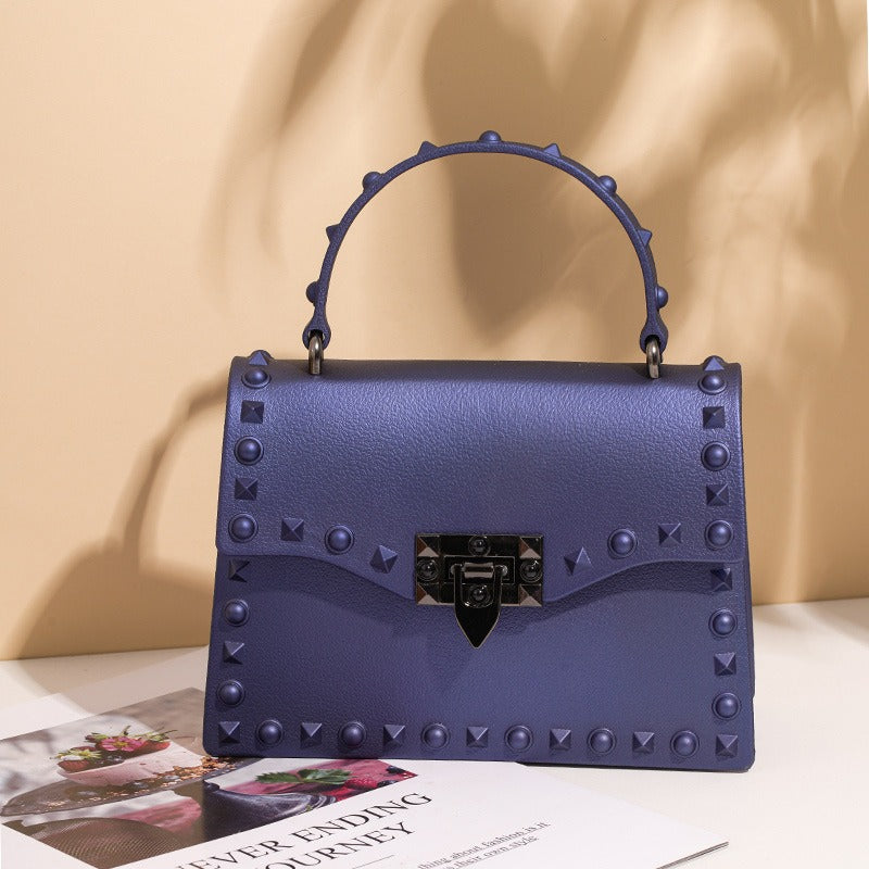 Bolso de PVC impermeable para mujer con cadena y tachuelas, estilo punk