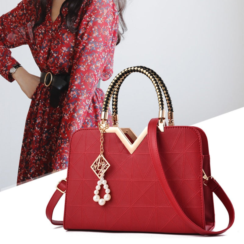 Bolso de mano y bandolera para mujer con bordado y asa superior