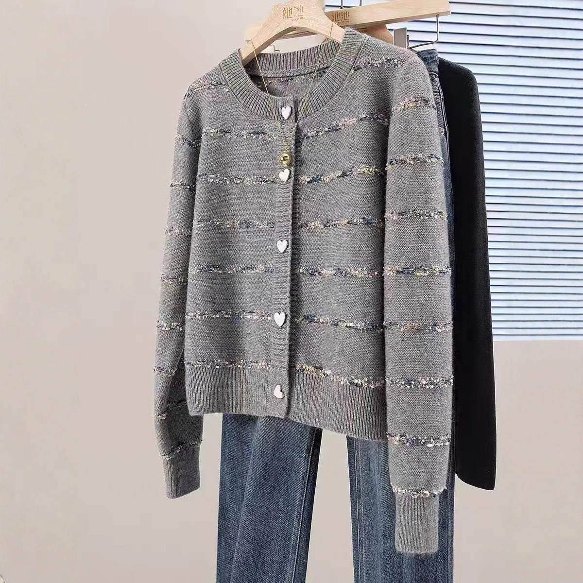 Striped cardigan with heart-shaped button sweater