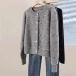 Striped cardigan with heart-shaped button sweater