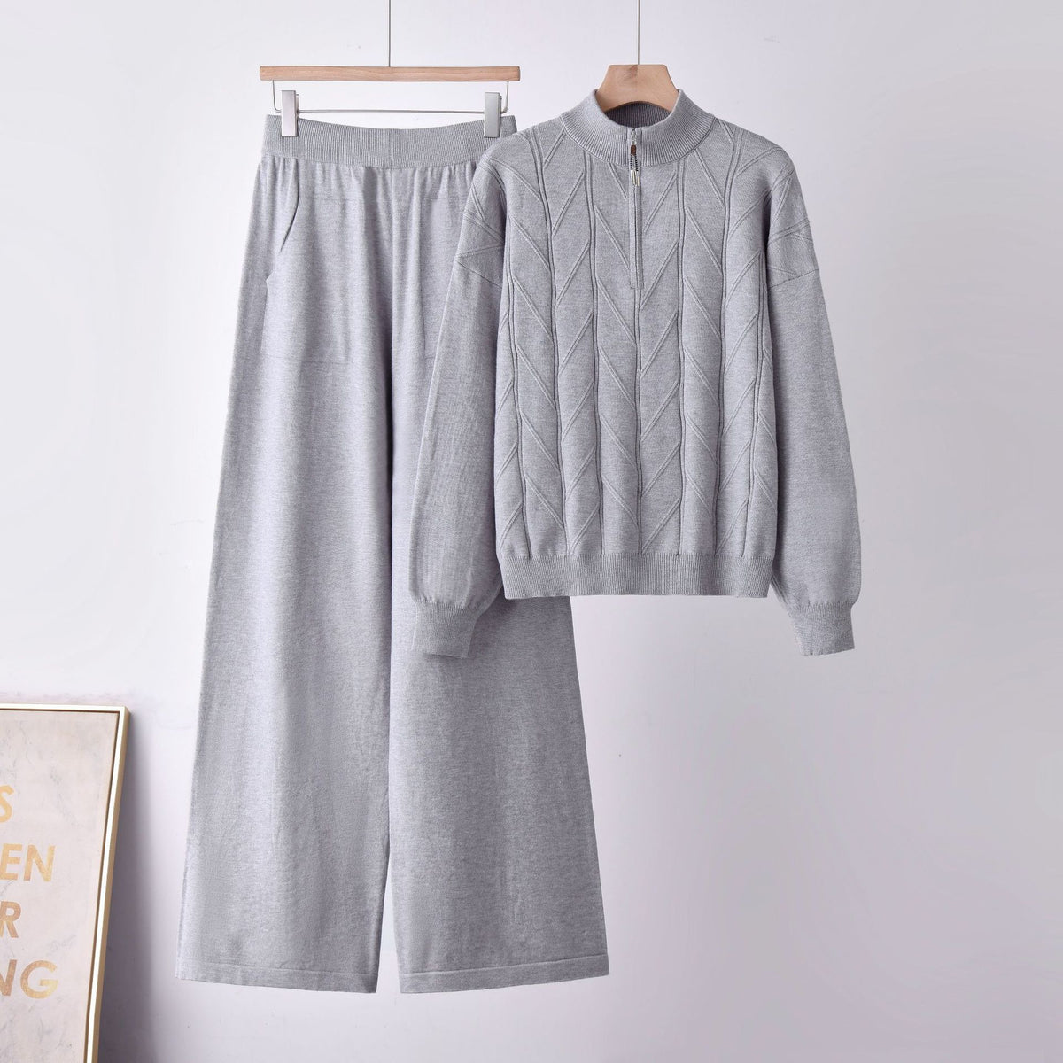 Conjunto de dos piezas con jersey de media cremallera y pantalón de pernera ancha
