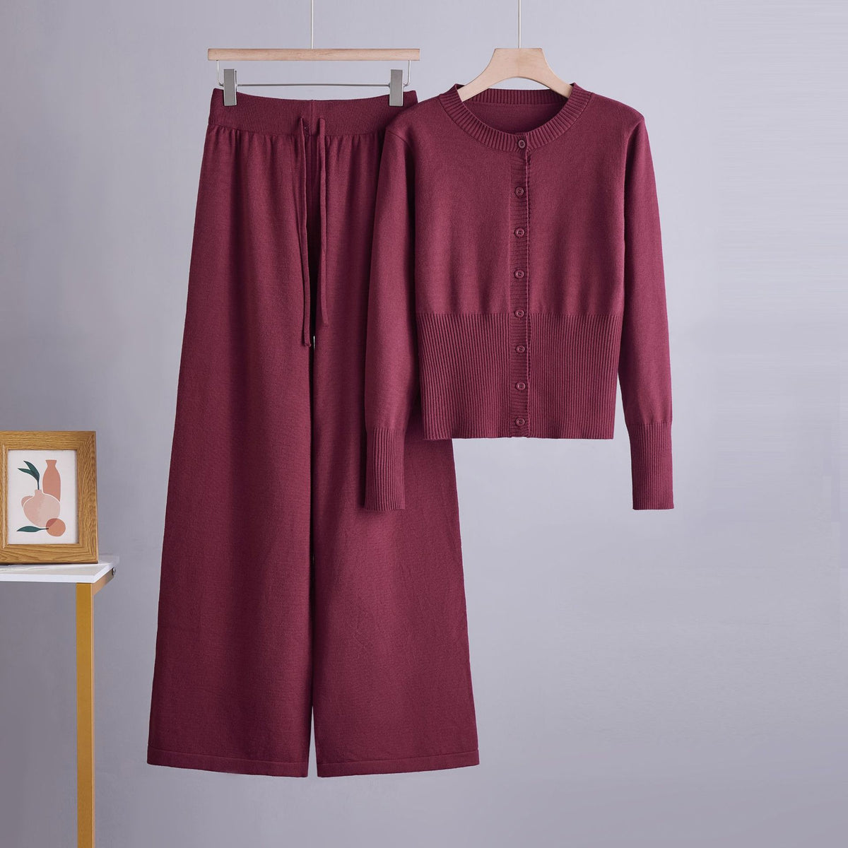 Conjunto de dos piezas con cárdigan de cuello redondo y botones y pantalón ancho recto de tiro alto