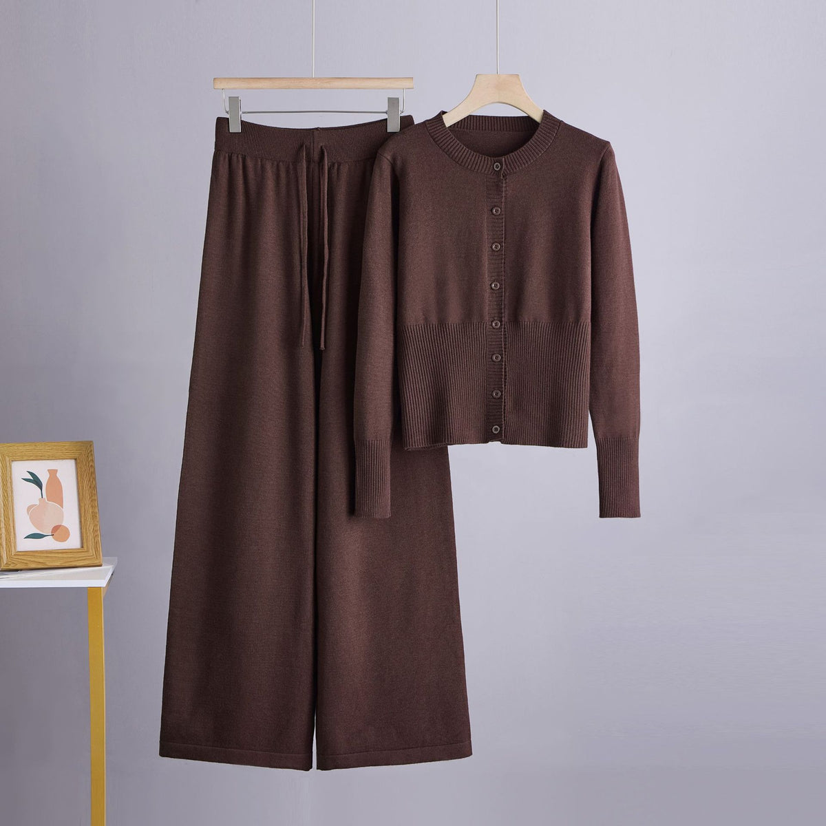 Conjunto de dos piezas con cárdigan de cuello redondo y botones y pantalón ancho recto de tiro alto