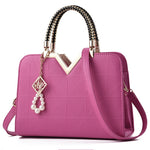 Bolso de mano y bandolera para mujer con bordado y asa superior